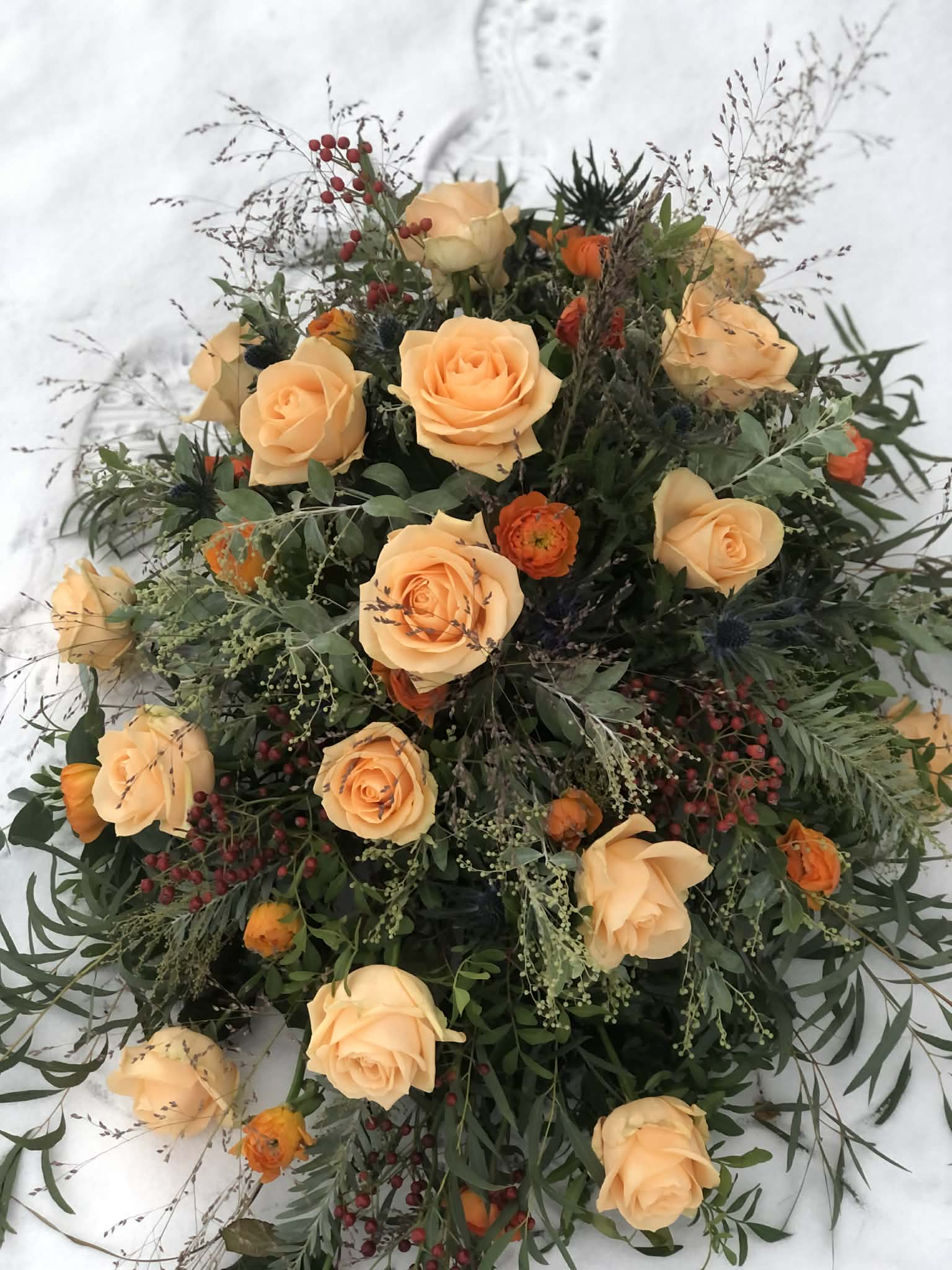 Begravningsbukett med rosor